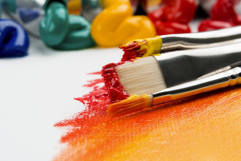 Students painting in the arts studio